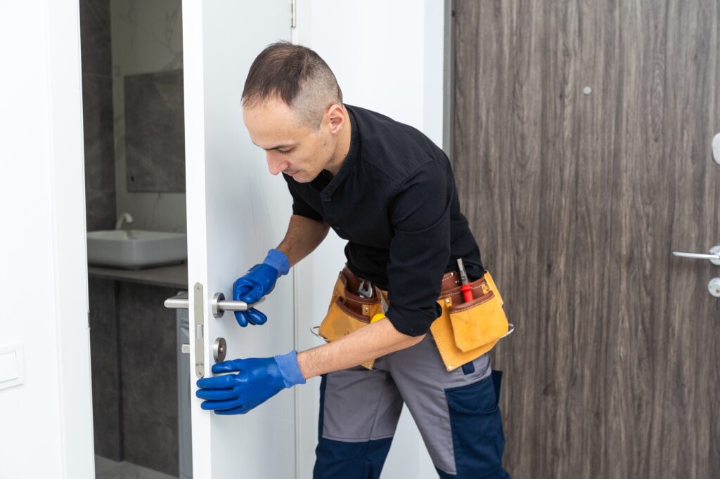 master of installation and repair of door locks at work